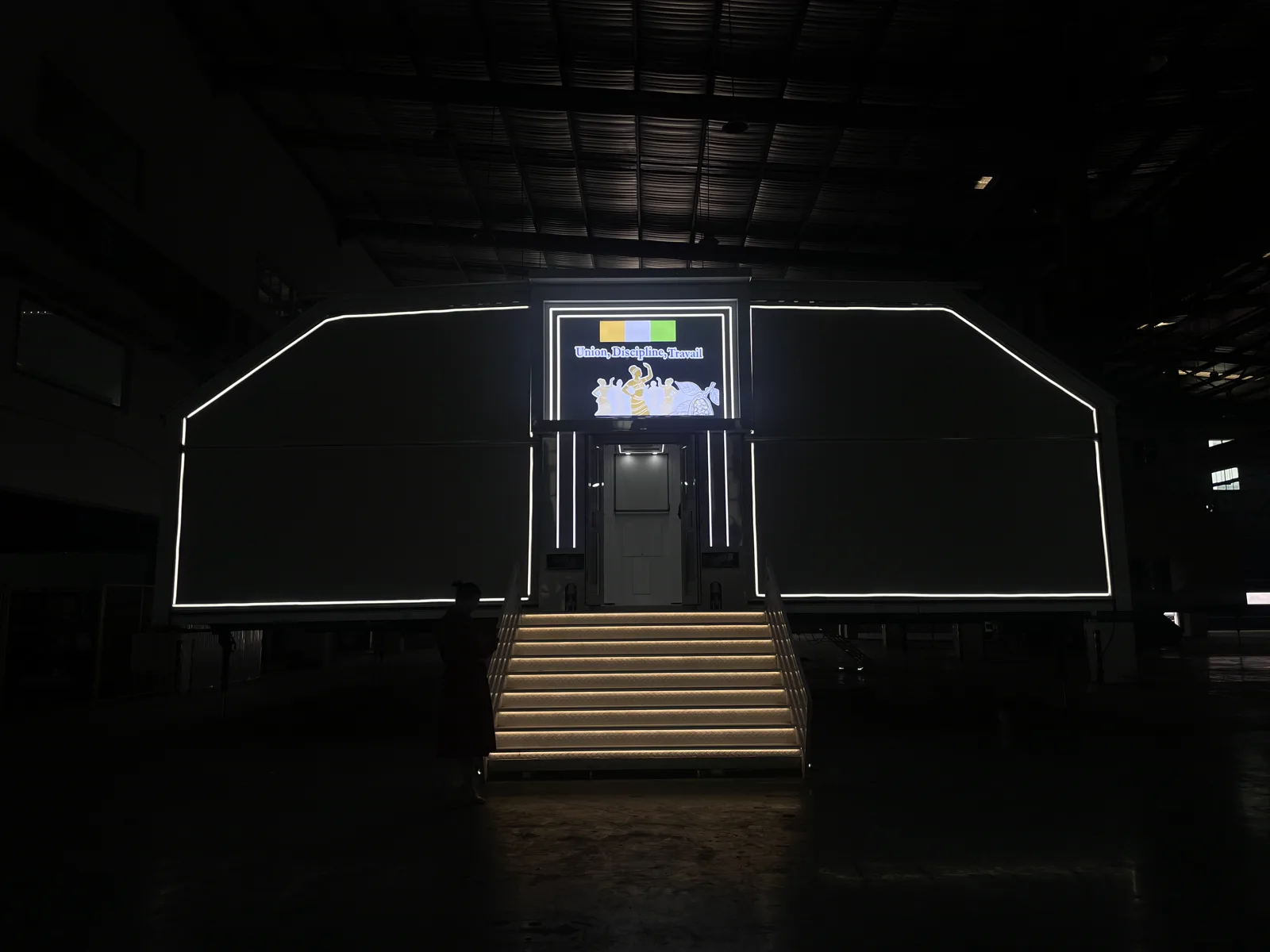 Côte d’Ivoire customer configuration at night — MBFD expandable event trailer